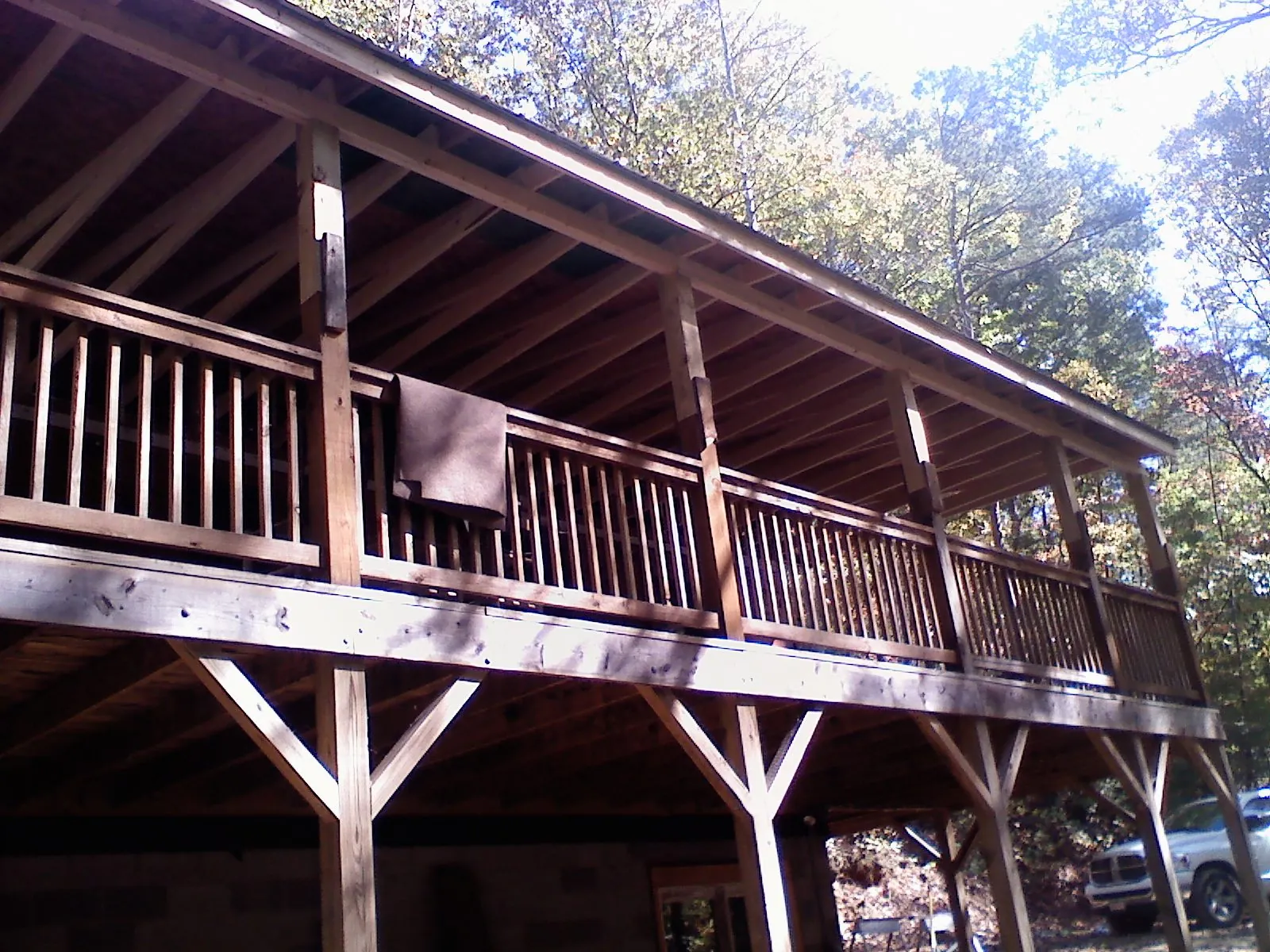 Timber framing under a new elevated porch and deck — Roof Leak Repair in Mediapolis by Roofing Brothers